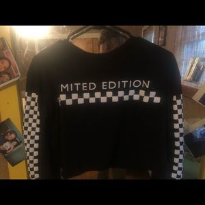 Black “limited edition” crop top